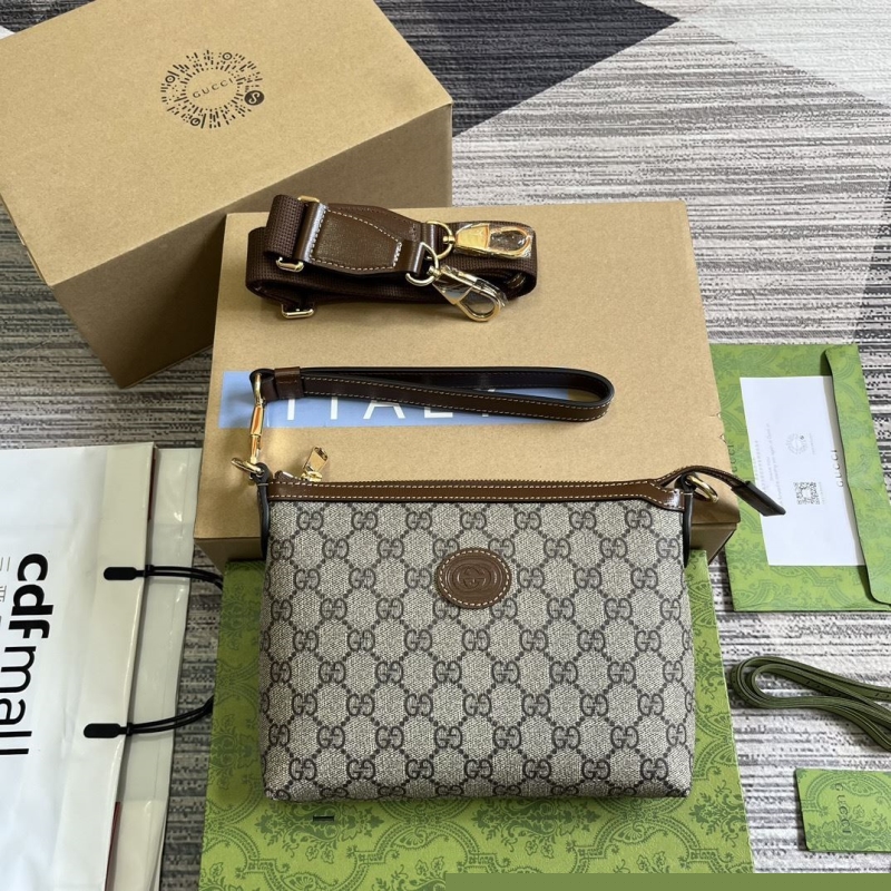 G*u*i clutch bags